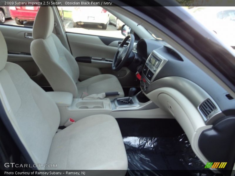 Obsidian Black Pearl / Ivory 2009 Subaru Impreza 2.5i Sedan