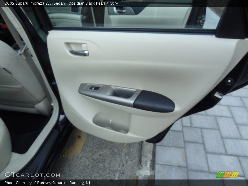 Obsidian Black Pearl / Ivory 2009 Subaru Impreza 2.5i Sedan