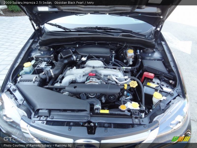 Obsidian Black Pearl / Ivory 2009 Subaru Impreza 2.5i Sedan