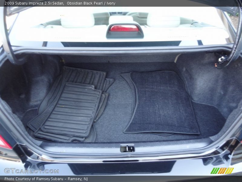 Obsidian Black Pearl / Ivory 2009 Subaru Impreza 2.5i Sedan