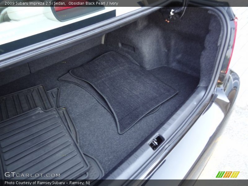 Obsidian Black Pearl / Ivory 2009 Subaru Impreza 2.5i Sedan