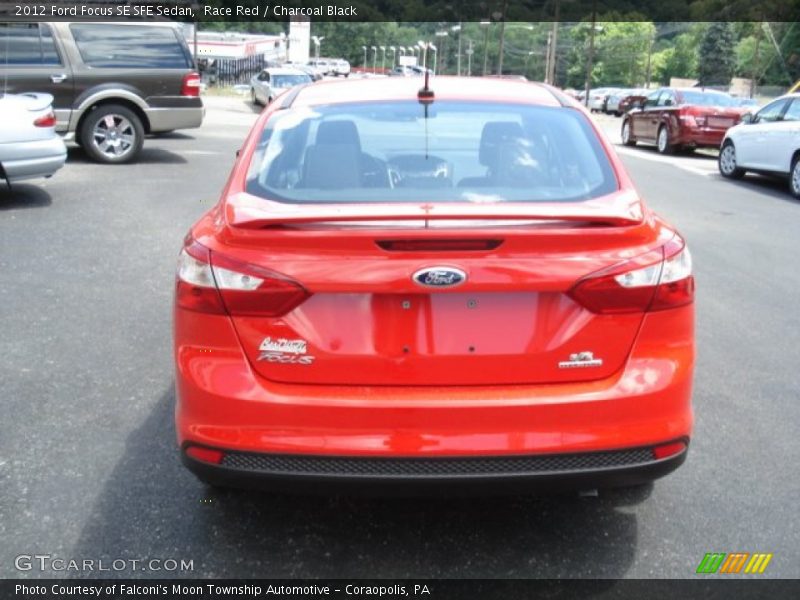 Race Red / Charcoal Black 2012 Ford Focus SE SFE Sedan