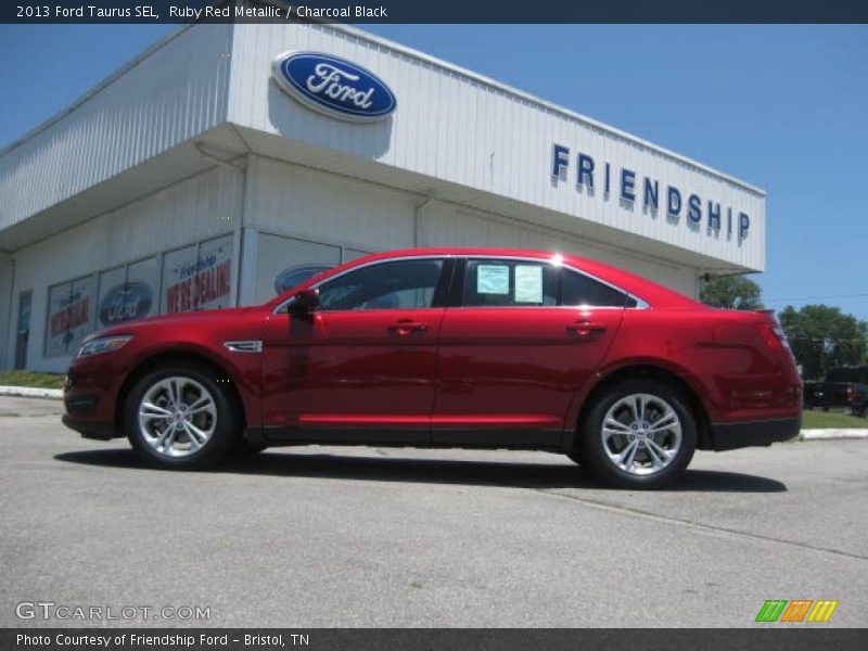 Ruby Red Metallic / Charcoal Black 2013 Ford Taurus SEL