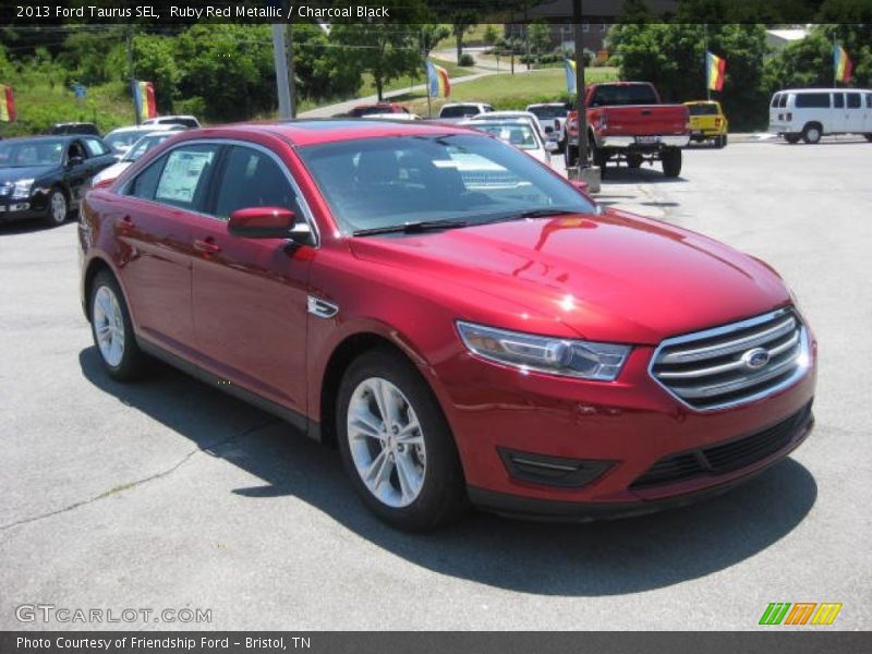Ruby Red Metallic / Charcoal Black 2013 Ford Taurus SEL