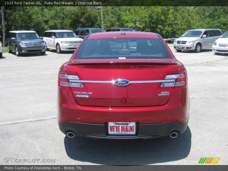 Ruby Red Metallic / Charcoal Black 2013 Ford Taurus SEL