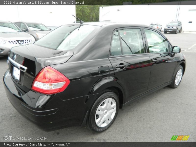 Super Black / Charcoal 2011 Nissan Versa 1.8 S Sedan