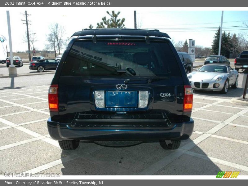 Midnight Blue Metallic / Stone Beige 2002 Infiniti QX4 4x4