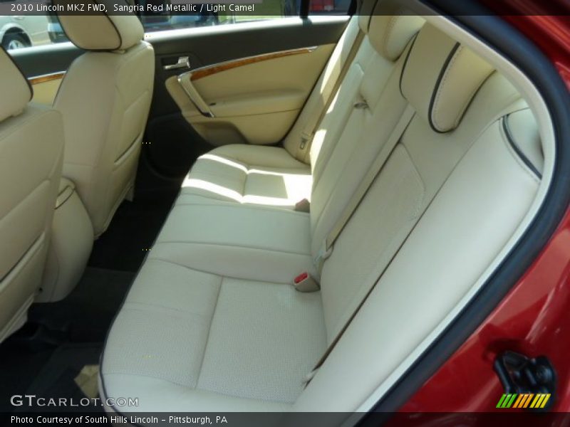 Sangria Red Metallic / Light Camel 2010 Lincoln MKZ FWD