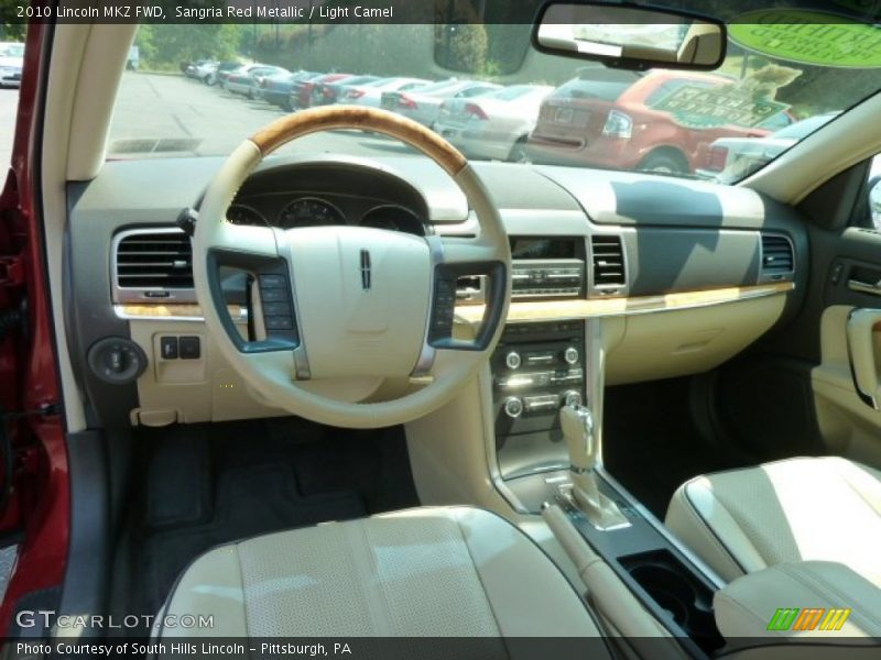 Sangria Red Metallic / Light Camel 2010 Lincoln MKZ FWD