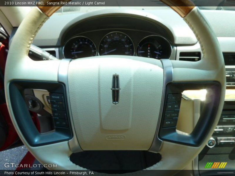 Sangria Red Metallic / Light Camel 2010 Lincoln MKZ FWD
