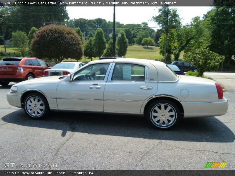 Ivory Parchment Tri Coat / Medium Dark Parchment/Light Parchment 2003 Lincoln Town Car Cartier