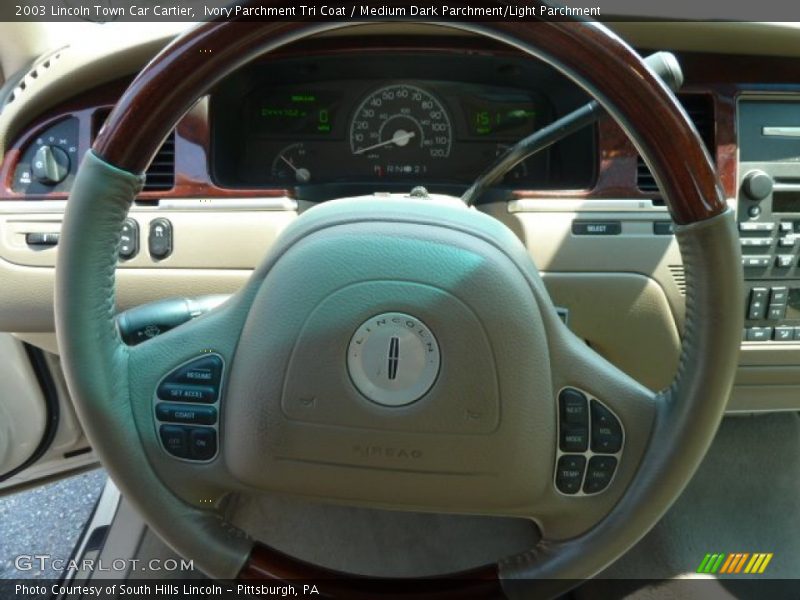 Ivory Parchment Tri Coat / Medium Dark Parchment/Light Parchment 2003 Lincoln Town Car Cartier