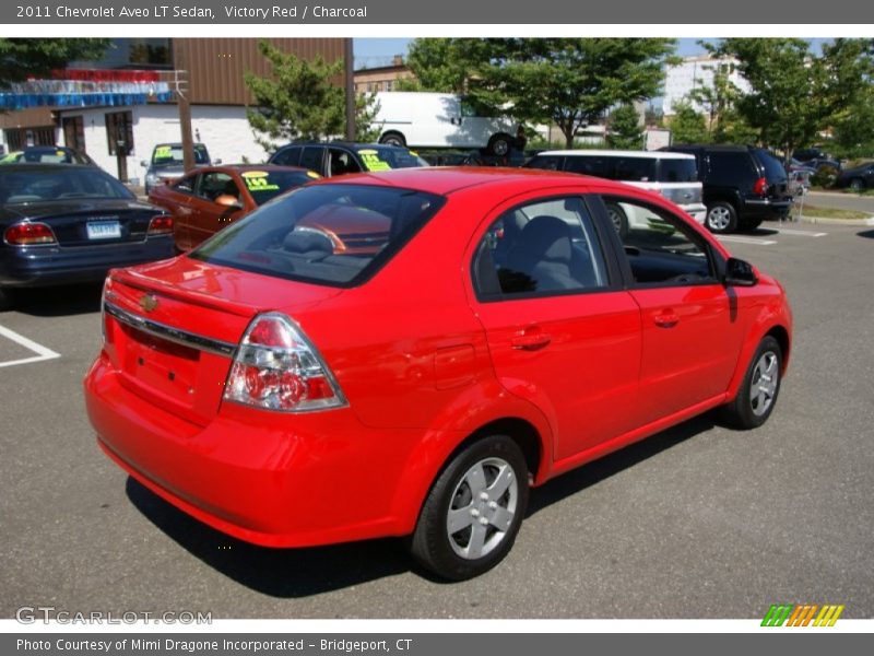 Victory Red / Charcoal 2011 Chevrolet Aveo LT Sedan