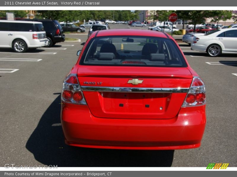 Victory Red / Charcoal 2011 Chevrolet Aveo LT Sedan
