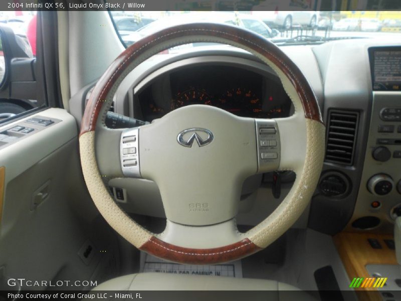 Liquid Onyx Black / Willow 2004 Infiniti QX 56