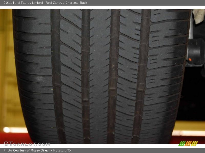 Red Candy / Charcoal Black 2011 Ford Taurus Limited