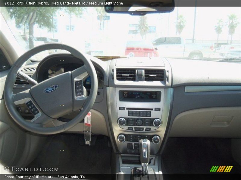 Red Candy Metallic / Medium Light Stone 2012 Ford Fusion Hybrid