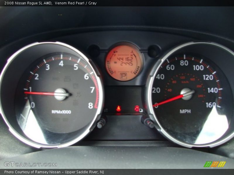 Venom Red Pearl / Gray 2008 Nissan Rogue SL AWD