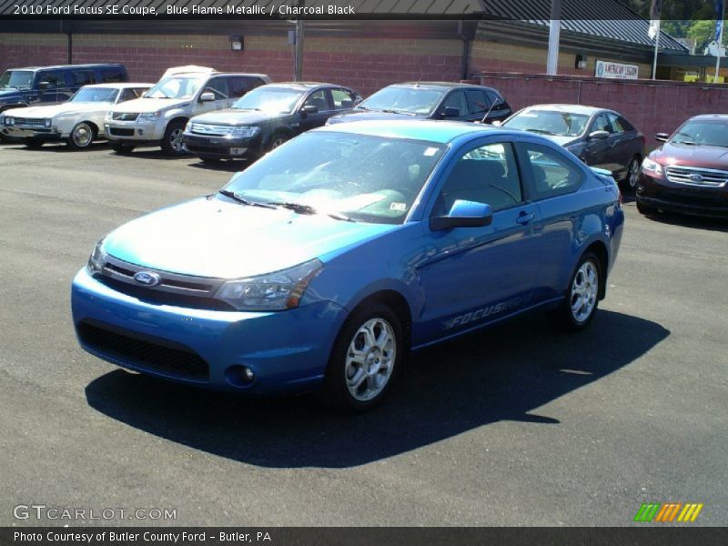 Blue Flame Metallic / Charcoal Black 2010 Ford Focus SE Coupe