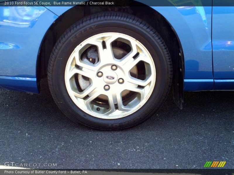 Blue Flame Metallic / Charcoal Black 2010 Ford Focus SE Coupe