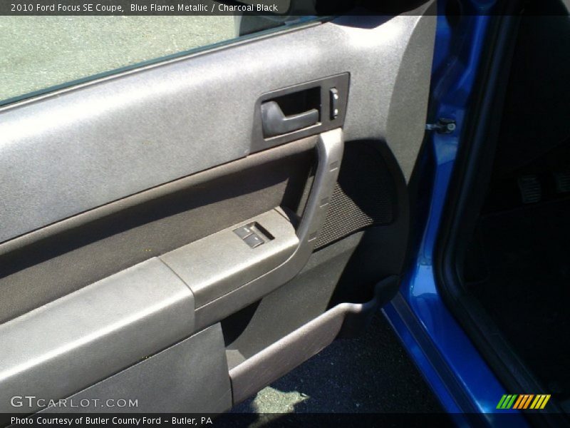 Blue Flame Metallic / Charcoal Black 2010 Ford Focus SE Coupe