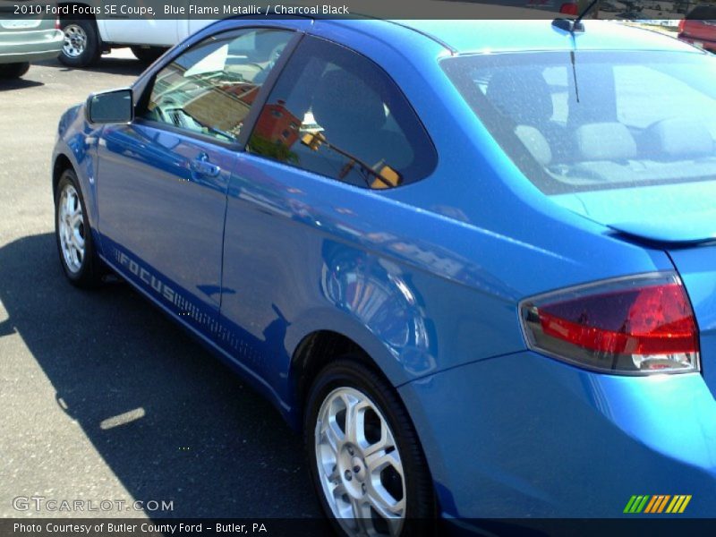 Blue Flame Metallic / Charcoal Black 2010 Ford Focus SE Coupe