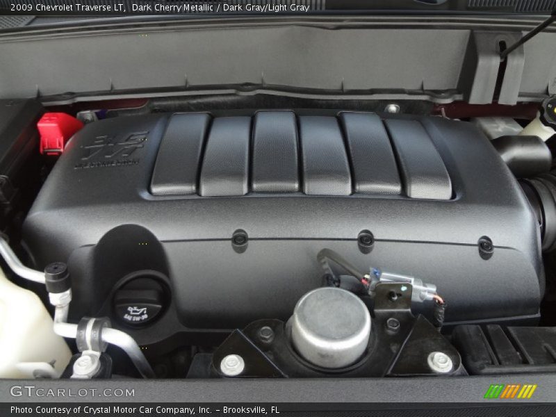 Dark Cherry Metallic / Dark Gray/Light Gray 2009 Chevrolet Traverse LT