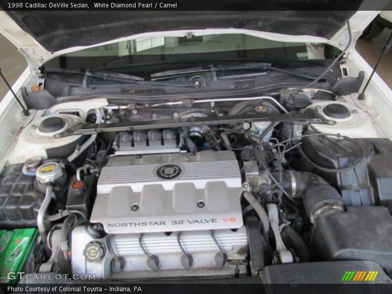 White Diamond Pearl / Camel 1998 Cadillac DeVille Sedan