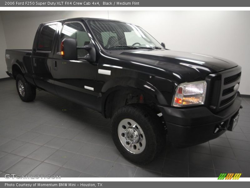 Front 3/4 View of 2006 F250 Super Duty XLT FX4 Crew Cab 4x4
