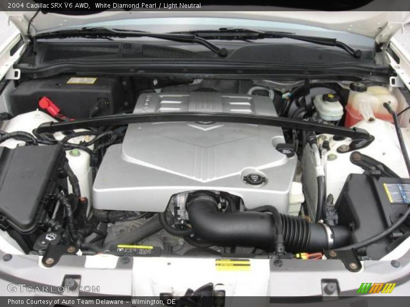 White Diamond Pearl / Light Neutral 2004 Cadillac SRX V6 AWD