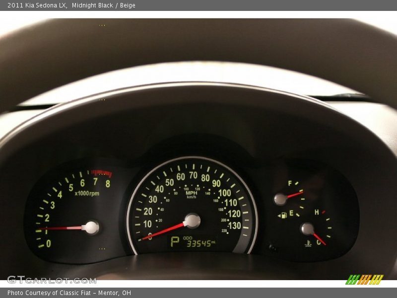 Midnight Black / Beige 2011 Kia Sedona LX