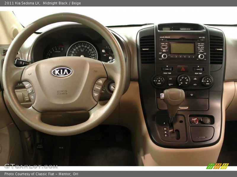 Midnight Black / Beige 2011 Kia Sedona LX