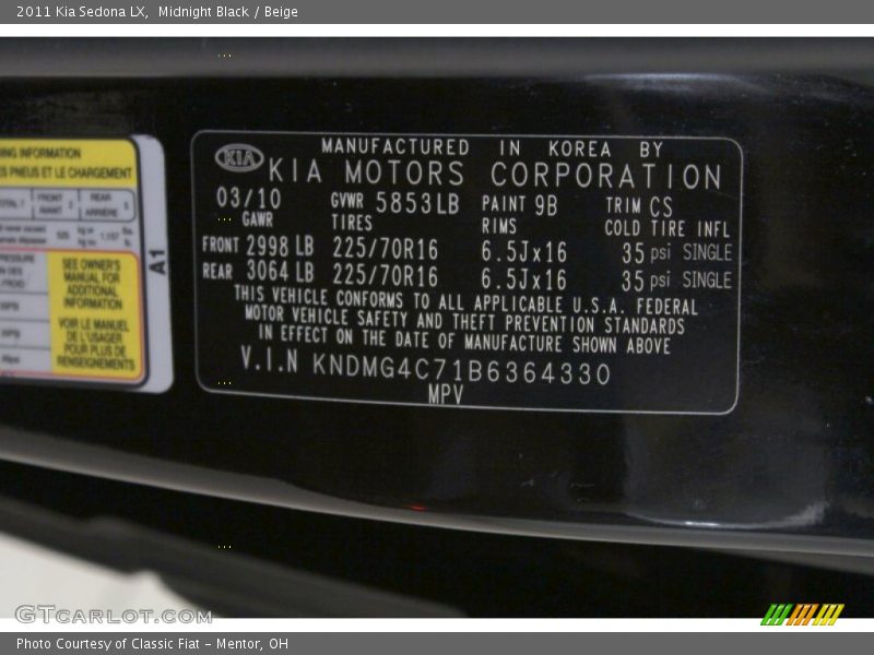 Midnight Black / Beige 2011 Kia Sedona LX