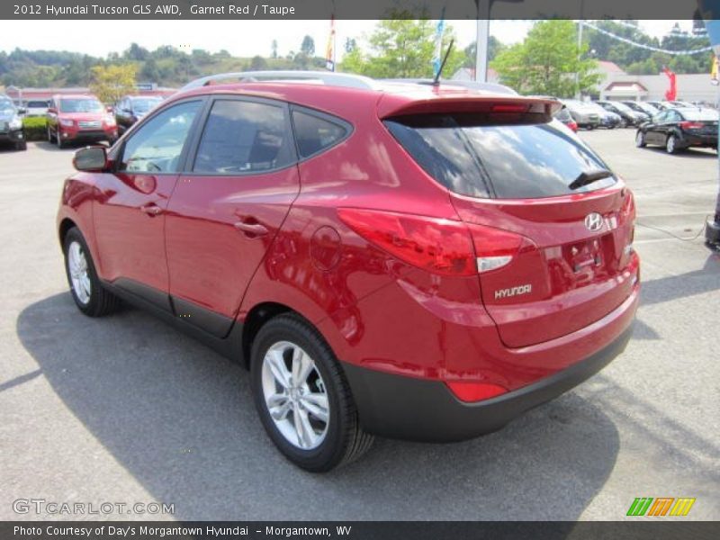 Garnet Red / Taupe 2012 Hyundai Tucson GLS AWD