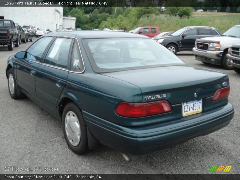 Midnight Teal Metallic / Grey 1995 Ford Taurus GL Sedan