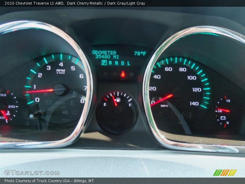 Dark Cherry Metallic / Dark Gray/Light Gray 2010 Chevrolet Traverse LS AWD