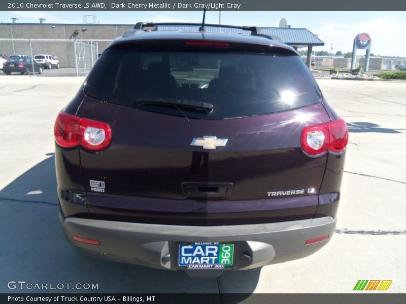 Dark Cherry Metallic / Dark Gray/Light Gray 2010 Chevrolet Traverse LS AWD