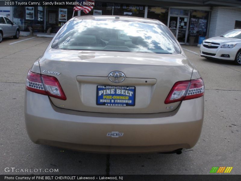 Sandy Beach Metallic / Bisque 2010 Toyota Camry