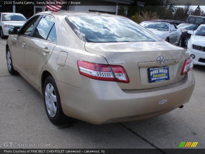Sandy Beach Metallic / Bisque 2010 Toyota Camry