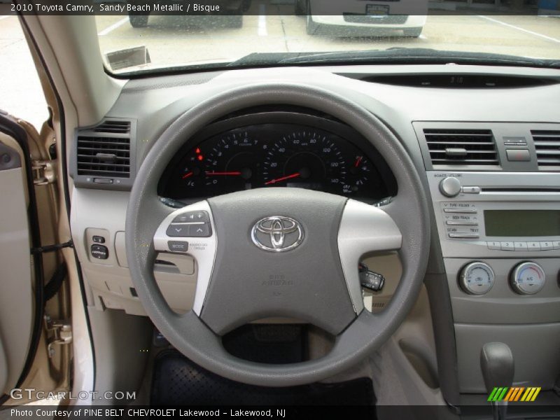 Sandy Beach Metallic / Bisque 2010 Toyota Camry