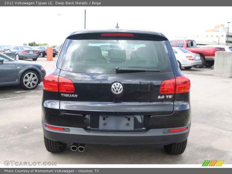 Deep Black Metallic / Beige 2012 Volkswagen Tiguan LE