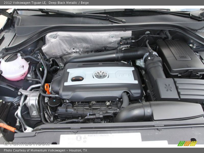 Deep Black Metallic / Beige 2012 Volkswagen Tiguan LE