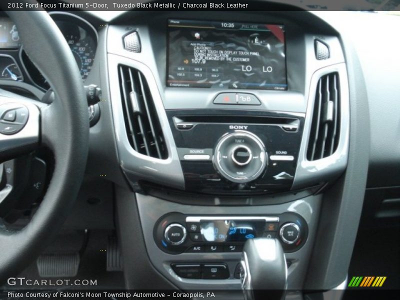 Tuxedo Black Metallic / Charcoal Black Leather 2012 Ford Focus Titanium 5-Door