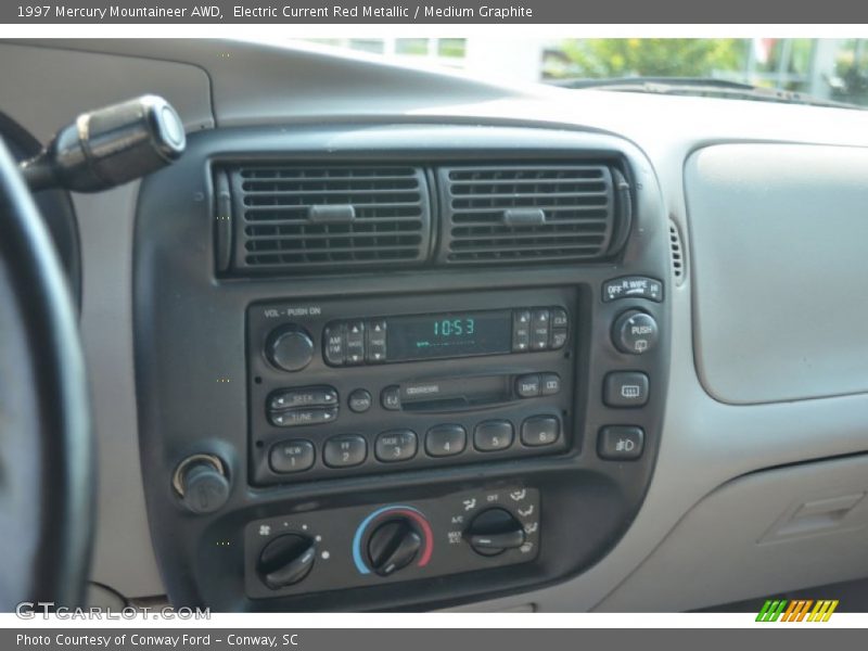 Electric Current Red Metallic / Medium Graphite 1997 Mercury Mountaineer AWD