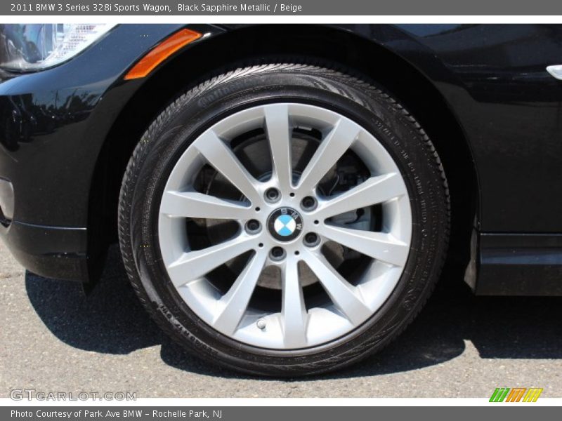 Black Sapphire Metallic / Beige 2011 BMW 3 Series 328i Sports Wagon