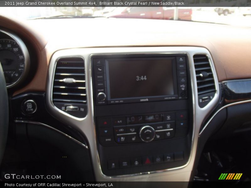 Brilliant Black Crystal Pearl / New Saddle/Black 2011 Jeep Grand Cherokee Overland Summit 4x4