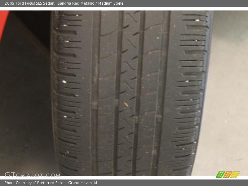 Sangria Red Metallic / Medium Stone 2009 Ford Focus SES Sedan
