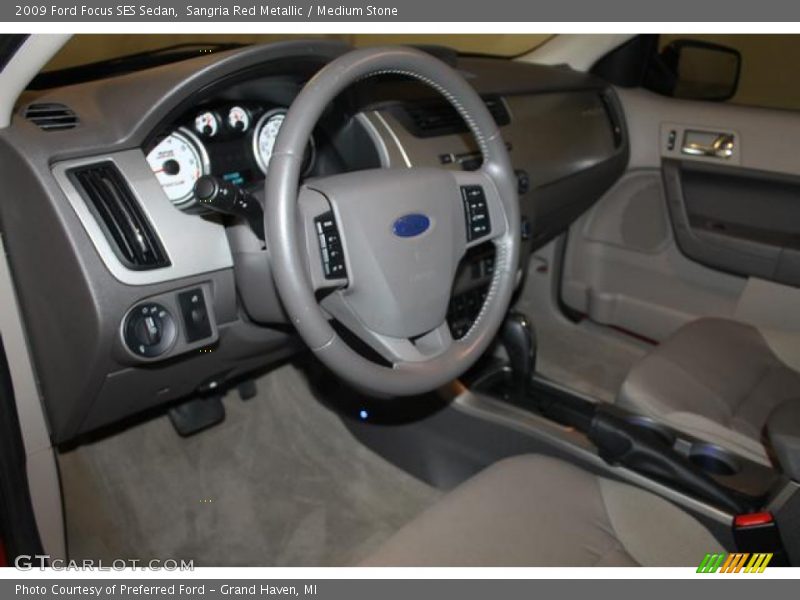 Sangria Red Metallic / Medium Stone 2009 Ford Focus SES Sedan