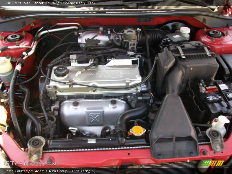 Phoenix Red / Black 2003 Mitsubishi Lancer OZ Rally