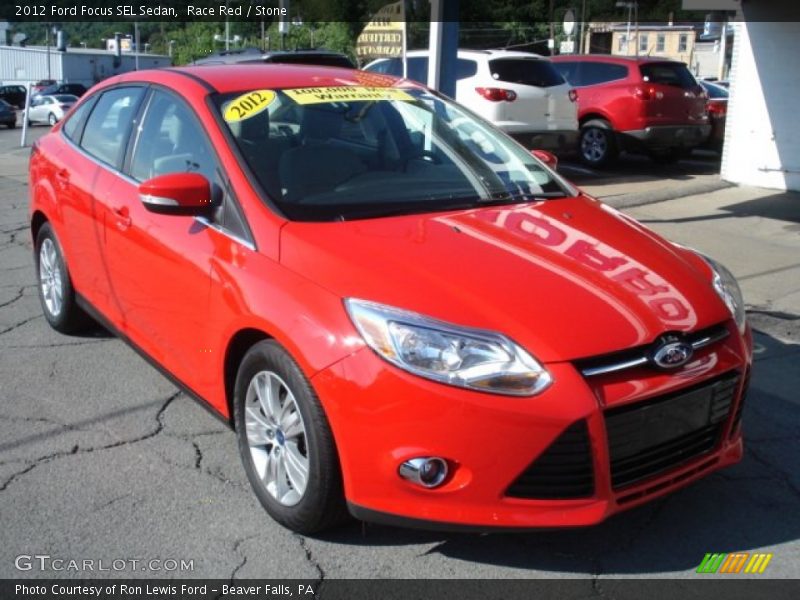 Race Red / Stone 2012 Ford Focus SEL Sedan